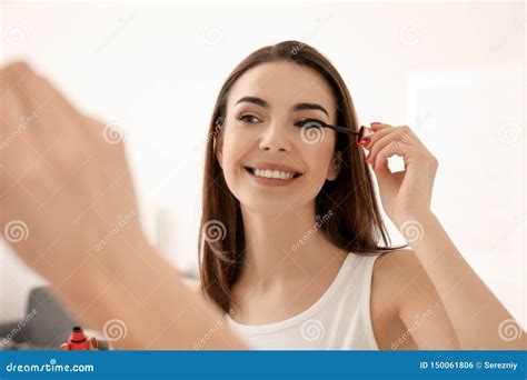 Morning of Beautiful Young Woman Applying Makeup at Home Stock Photo ...
