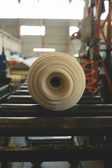 Photo of rolled up material in the factory