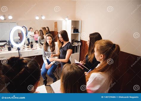 Makeup Teacher with Her Student Girls. Makeup Tutorial Lesson at Beauty ...