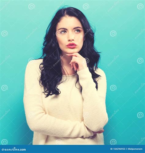 Young Woman in a Thoughtful Pose Stock Image - Image of serious ...