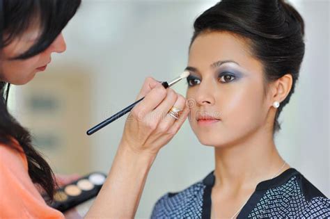 Eye Makeup Woman Applying Eyeshadow Powder. Young Beautiful Woman ...