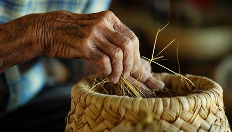Premium Photo | Artisan crafting traditional wicker basket hands