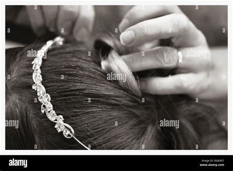 Fixing bride hi-res stock photography and images - Alamy