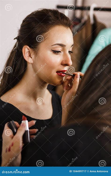 Makeup Artist Applying Lipstick Stock Image - Image of femininity ...