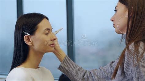 Makeup Teacher with His Student. Make-up Lesson at Beauty School ...