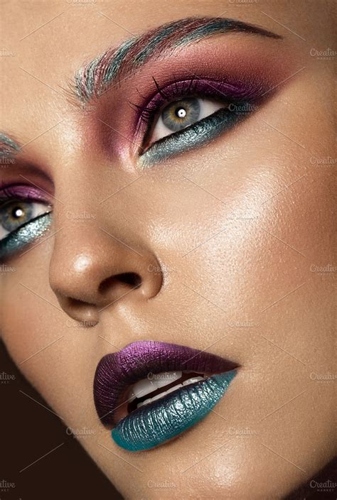 Beautiful girl with creative colorful makeup. Beauty face. ~ Beauty ...