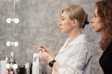 A Professional Makeup Artist Conducts Training on a Makeup Course ...