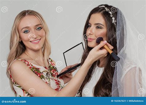 Woman Makeup Artist Holding Make Up Brush and Applying Cosmetic on ...