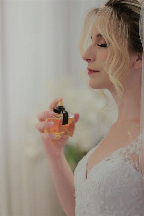 A Bride Spraying Perfume · Free Stock Photo
