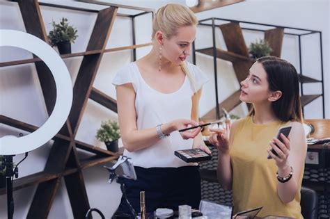 Premium Photo | Makeup consultation. dark-haired young woman feeling ...