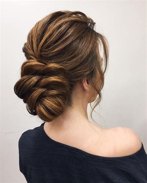 What bridal hair artistry truly complements a sophisticated gown’s neckline and style?