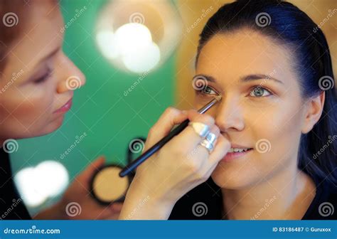 Makeup Artist Applying Eyeshadow Stock Image - Image of eyes, brush ...