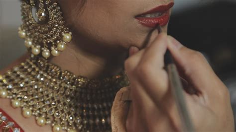 Close-up of permanent makeup application on the contour of the upper ...