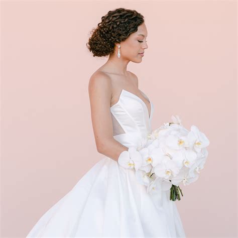 10 Low Bun Wedding Hairstyles for Every Type of Bride